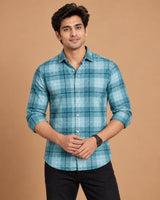 Teal blue check shirt - seated view