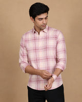 Pink check casual shirt - three-quarter front view